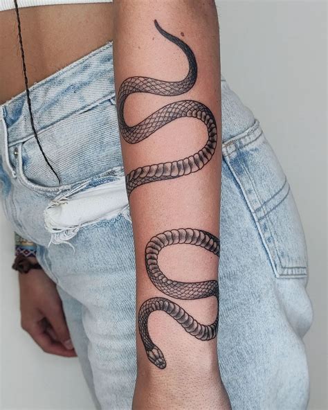 snake wrapped around arm tattoo|50+ AMAZING SNAKE TATTOO DESIGNS & THEIR。